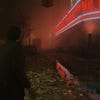 Alan stands on a deserted Manhattan street in Alan Wake 2, without any ray tracing or path tracing enabled.