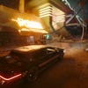 A street scene in Cyberpunk 2077 with path tracing on.