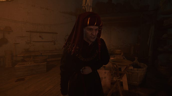 A close-up of Chamberlain Ulrich in Kingdom Come: Deliverance 2, clutching his stomach in pain.